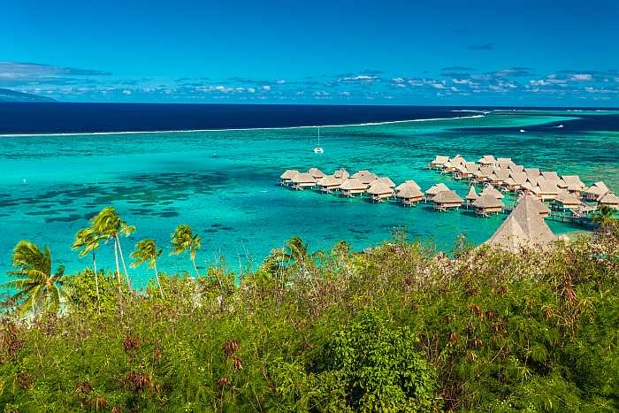 over the water bungalows in tahiti.